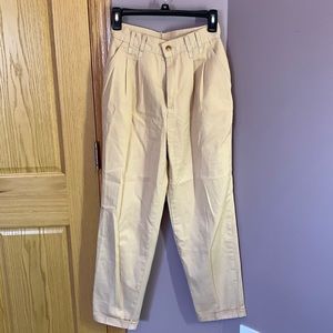 Original pair of Chic khakis. Size 4 petite. Very light khaki color.